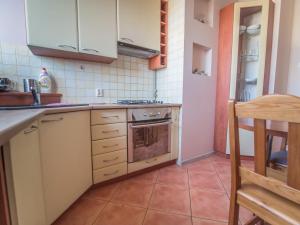 Kuchyňa alebo kuchynka v ubytovaní Krosna Street Apartament