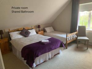 Voodi või voodid majutusasutuse The Curragh Country House Accommodation toas