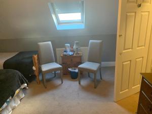 Istumisnurk majutusasutuses The Curragh Country House Accommodation
