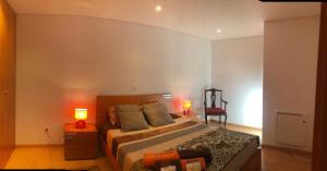 Кровать или кровати в номере Casa do Palheiro
