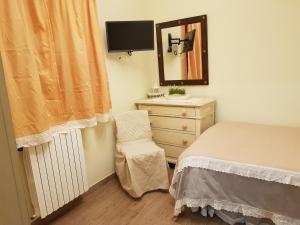 Posteľ alebo postele v izbe v ubytovaní Casale Cisanello