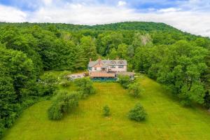 an aerial view of a house in the middle of a field at Apple Tree Inn in Lenox