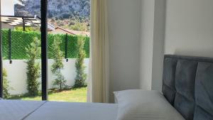 Ένα ή περισσότερα κρεβάτια σε δωμάτιο στο Dalyan Villa Valenti +59 φωτογραφίες