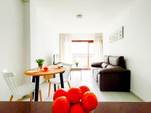 A seating area at Cozy Beach Holiday Home in Playa del Ingles