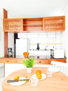 A kitchen or kitchenette at Cozy Beach Holiday Home in Playa del Ingles