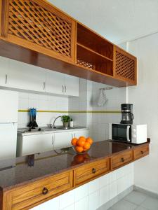 A kitchen or kitchenette at Cozy Beach Holiday Home in Playa del Ingles