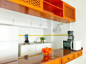 A kitchen or kitchenette at Cozy Beach Holiday Home in Playa del Ingles