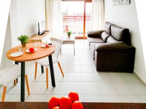 A seating area at Cozy Beach Holiday Home in Playa del Ingles