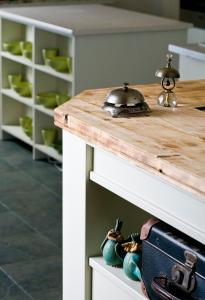 a kitchen counter with a pot on top of it at Budapest Rooms Bed and Breakfast in Budapest