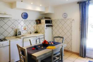 Kjøkken eller kjøkkenkrok på Apartment, Bellegarde
