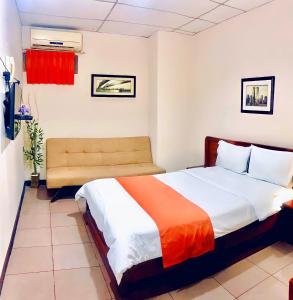 Katil atau katil-katil dalam bilik di Hotel Madrigal