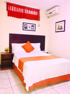 Katil atau katil-katil dalam bilik di Hotel Madrigal