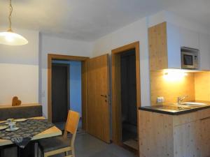 A kitchen or kitchenette at Apartment in Flachau near Salzburg Alps
