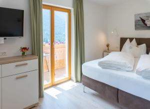 Postel nebo postele na pokoji v ubytování Residence Töglhof