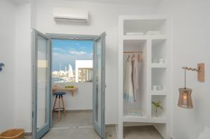 A bathroom at Aegean Jasmine - In The Center