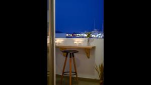 A balcony or terrace at Aegean Jasmine - In The Center