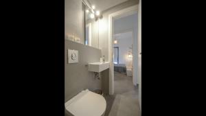 A bathroom at Aegean Jasmine - In The Center
