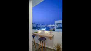 A balcony or terrace at Aegean Jasmine - In The Center