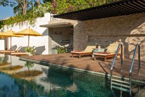Bazén v ubytování SAMSAM Yao Noi - ANDAMAN MAGIC & ART VILLAS nebo v jeho okolí + 32 fotografií