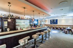 The lounge or bar area at Neufeldersee Hotel & Restaurant Még 23 kép