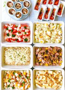a group of four containers filled with different types of food at Premier Hotel CABIN PRESIDENT Osaka in Osaka