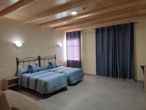 Posteľ alebo postele v izbe v ubytovaní Hotel Novo