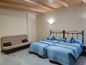 Posteľ alebo postele v izbe v ubytovaní Hotel Novo