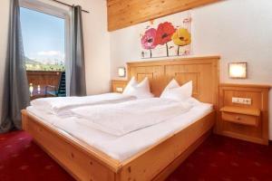 Postel nebo postele na pokoji v ubytování Gästehaus Kastenhof