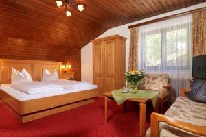 Postel nebo postele na pokoji v ubytování Gästehaus Kastenhof