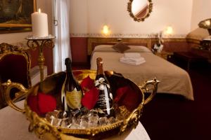 Nápoje v ubytování Hotel Villa Pigalle