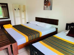 Ein Bett oder Betten in einem Zimmer der Unterkunft Sethway Village