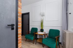 Część wypoczynkowa w obiekcie Apartments Osiedle Szkolne Cracow by Noclegi Renters