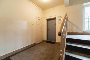 Łóżko lub łóżka w pokoju w obiekcie Apartments Osiedle Szkolne Cracow by Noclegi Renters