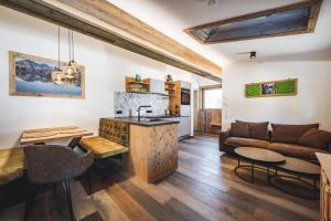 A seating area at Wood Apartments by Trendlbrugger