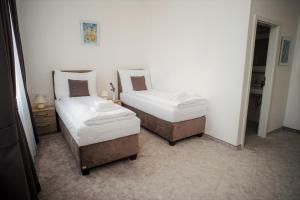 Posteľ alebo postele v izbe v ubytovaní BIVIO hotel