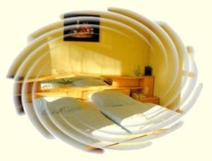Posteľ alebo postele v izbe v ubytovaní Hotel Luginsland