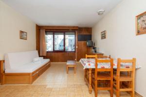 Ένα ή περισσότερα κρεβάτια σε δωμάτιο στο Apartamentos Lake Placid 3000 +37 φωτογραφίες