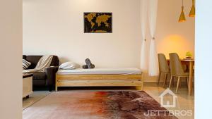 Cama ou camas em um quarto em Havona Residence By JettBros Johor Bahru