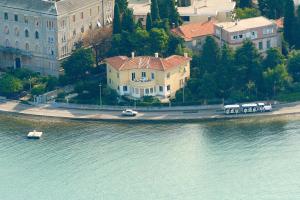 an aerial view of a house next to the water at Apartment Ira in Zadar