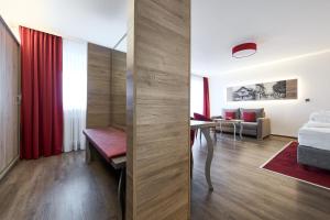 Postel nebo postele na pokoji v ubytování Hotel Ritter Badenweiler