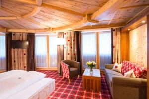 Ένα ή περισσότερα κρεβάτια σε δωμάτιο στο Hotel Solaria Ischgl - 4 superior