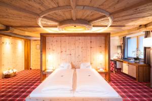 Ένα ή περισσότερα κρεβάτια σε δωμάτιο στο Hotel Solaria Ischgl - 4 superior