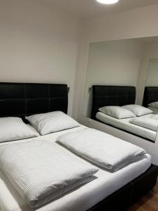 Postel nebo postele na pokoji v ubytování Apartman Nico
