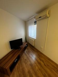 TV a/nebo společenská místnost v ubytování Apartman Nico