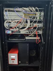 a server cabinet with manyabling in it at Hotel Apartamento Bajamar in Las Palmas de Gran Canaria