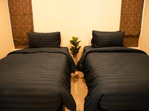 Krevet ili kreveti u jedinici u okviru objekta Villa15 Huahin