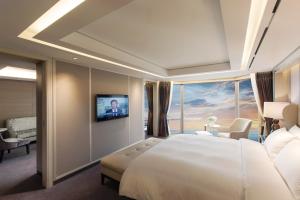 TV a/nebo společenská místnost v ubytování Paradise Hotel Busan