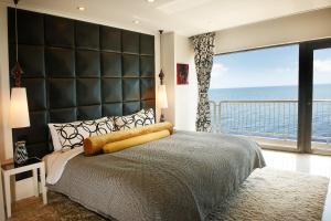 Postel nebo postele na pokoji v ubytování Paradise Hotel Busan
