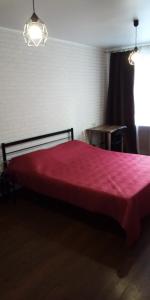 Ένα ή περισσότερα κρεβάτια σε δωμάτιο στο Apartment in Kamchatka on Abelya