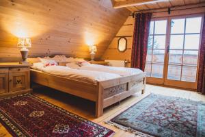 Katil atau katil-katil dalam bilik di Dolisiówka SPA Premium